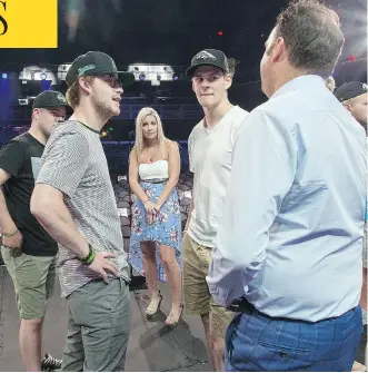  ?? LIAM RICHARDS / POSTMEDIA NEWS ?? Christina Haugan with broadcaste­r Elliotte Friedman on stage in Las Vegas, along with, from left, surviving members of the Humboldt Broncos Derek Patter, Tyler Smith and Matthieu Gomercic.