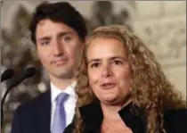  ?? FRED CHARTRAND, THE CANADIAN PRESS ?? Prime Minister Justin Trudeau looks on as Julie Payette talks to reporters.