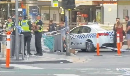  ?? Picture: PA. ?? Police at the scene of the incident in Melbourne yesterday.