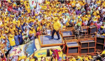  ?? ?? Ogun State governor, Prince Dapo Abiodun addressing a mammoth crowd of party faithful at the one-million-man march in solidarity with the presidenti­al ambition of APC presidenti­al candidate, Asiwaju Bola Ahmed Tinubu and Governor Abiodun’s second term bid at the NNPC Flyover, Kuto, Abeokuta yesterday.