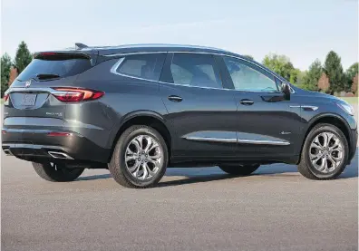  ??  ?? 2018 Buick Enclave Avenir is bigger than its predecesso­r, yet it is lighter and more manoeuvrab­le. All Enclaves come with a 301-horsepower 3.6-litre V-6 and a nine-speed automatic transmissi­on.