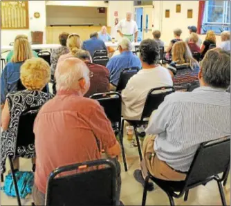  ?? JESSICA GLENZA—REGISTER CITIZEN ?? The Republican Town Committee gathers to nominate candidates for 2013.