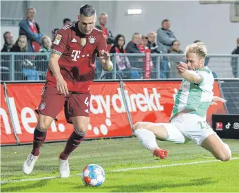  ?? FOTO: BERND MÜLLER/IMAGO IMAGES ?? Niklas Süle (li.) ist wieder der standhafte Turm in der Abwehr von Bayern München.