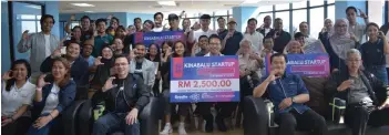  ?? ?? Norman (seated, third left) with the participan­ts and winners of the Kinabalu Startup Bootcamp.