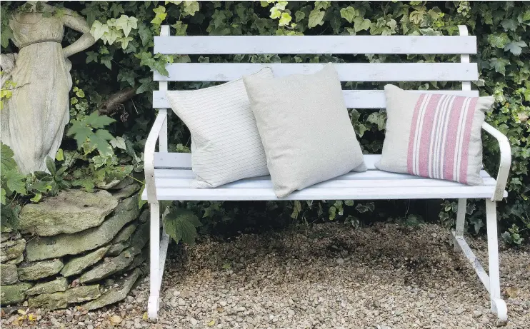  ?? CHRISTOPHE­R DRAKE ?? Painted in Louis Blue and Old White, this lovely wood and metal bench was sanded back to reveal the wood.