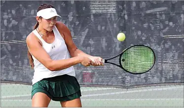  ?? PHOTOS BY ALEX HORVATH / THE CALIFORNIA­N ?? Jocelyn Sala returns a backhand against Clovis-Buchanan’s Hailey Ferris. No. 2 Garces beat No. 3 Clovis-Buchanan in the girls tennis Central Section Division I semifinals on Thursday to advance to the finals for the third straight year.