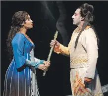  ?? RICHARD TERMINE/ METROPOLIT­AN OPERA ?? Golda Schultz, left, is Pamina and Charles Castronovo is Tamino in this season’s production of Mozart’s The Magic Flute at the Metropolit­an Opera in New York.