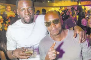  ?? Tony Tran Photograph­y ?? Golden State forward Draymond Green, left, and comedian Dave Chappelle celebrate the Warriors’ NBA championsh­ip at Jewell Nightclub at Aria on Friday.