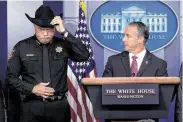  ?? Andrew Harnik / Associated Press ?? Tarrant County Sheriff Bill Waybourn, left, sparked outrage with his comments about migrants at a news conference with ICE’s acting director, Matt Albence.