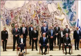  ?? (AP/Marc Israel Sellem) ?? Prime Minister Benjamin Netanyahu (center, seated) and the leaders of all political parties in Israel pose for a photo Tuesday in Jerusalem after the swearing-in ceremony for Israel’s 24th government.