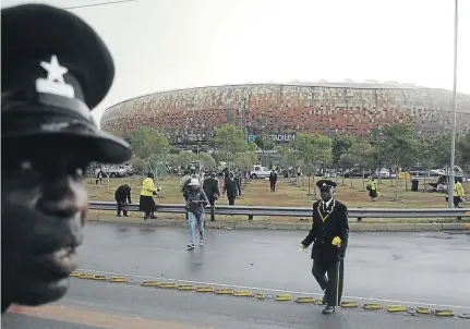  ?? /ZIPHOZONKE LUSHABA ?? Thousands worshipper­s packed FNB Stadium in Nasrec, outside Soweto, yesterday for a day of prayer that was address by ZCC’s bishop Barnabas Lekganyane, among others.