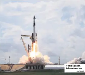  ?? Joe Raedle ?? > The SpaceX Falcon 9 rocket