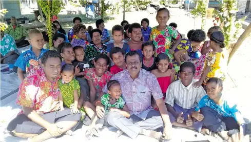  ?? Photo: Peni Komaisavai ?? The Minister for Local Government, Urban Developmen­t, Housing and Environmen­t Parveen Bala (middle) with the women and children of Natanuku Village in Ba, on August 10, 2018.