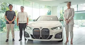  ?? ?? From left are San Miguel Corp.’s Jacob Ang, BMW Philippine­s President Spencer Yu, and BMW Group Asia Area Sales Manager Jessica Carret.