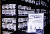  ?? [CHRIS LANDSBERGE­R/ THE OKLAHOMAN] ?? Okie Clean hand sanitizer and all purpose cleaner products are shelved at the Okie Clean warehouse.