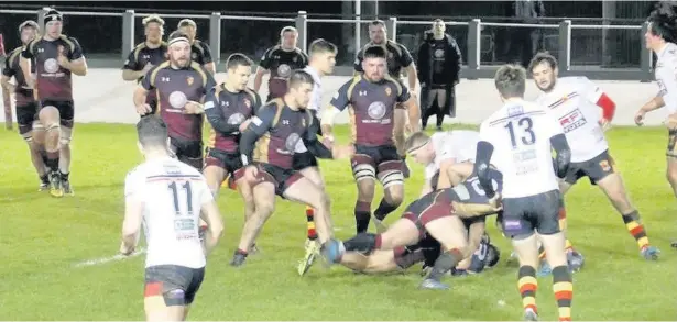  ?? Picture: LIZ BRYAN ?? Intense action as RGC (dark strip) take on Carmarthen Quins