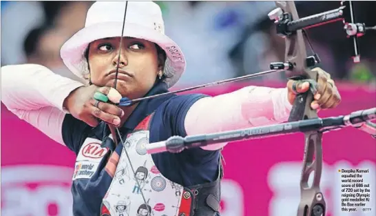  ?? GETTY ?? Deepika Kumari equalled the world record score of 686 out of 720 set by the reigning Olympic gold medallist Ki Bo Bae earlier this year.