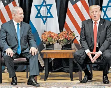  ?? EVAN VUCCI/AP ?? President Donald Trump meets Israeli Prime Minister Benjamin Netanyahu in New York in 2017.