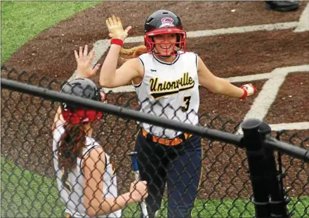  ?? BILL RUDICK — FOR DIGITAL FIRST MEDIA ?? Unionville’s Maddie Boorse and Analise Griffiths share a high five after both scored during Thursday’s win over Rustin in Aston.