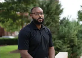  ??  ?? Justin Hansford, a Howard University professor of law, was a key participan­t in the 2014 Black Lives Matter protests in Ferguson, where he volunteere­d on the front lines as a legal observer. Photograph: Nate Palmer/The Guardian