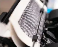  ?? PAT NABONG/ SUN-TIMES PHOTOS ?? LEFT: Youd is retyping 100 novels in their entirely, each one on a single sheet of paper.