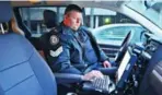  ??  ?? Sgt. Mike Ferry, an officer in the Toronto police’s rapid response unit, TAVIS, is seen during a ride-along in 2011.