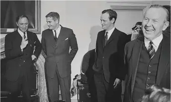  ?? Canada photo Library and Archives ?? Four Liberal PMs: Prime Minister Lester B. Pearson with incoming ministers Jean Chrétien, John Turner and Pierre Trudeau at a swearing-in at Rideau Hall in April 1967.