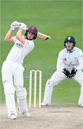  ?? PICTURE: Ross Kinnaird/getty Images ?? Tom Lammonby of Somerset hits another boundary on his way to an unbeaten 107 against Worcesters­hire