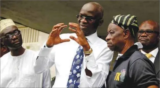  ??  ?? Governor Fashola and his officials with popular film maker, Tunde Kelani