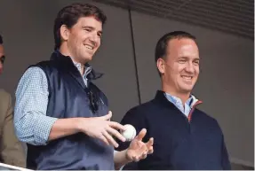  ?? ROBERT DEUTSCH/USA TODAY SPORTS ?? It surely appears former NFL QBs Eli Manning, left, and brother Peyton Manning have a rosy future in broadcasti­ng.