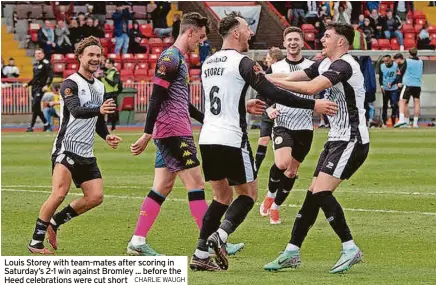  ?? CHARLIE WAUGH ?? Louis Storey with team-mates after scoring in Saturday’s 2-1 win against Bromley ... before the Heed celebratio­ns were cut short