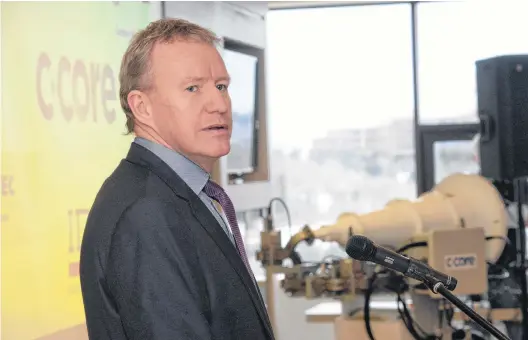  ?? JOE GIBBONS/THE TELEGRAM ?? Paul Griffin, president CEO of C-CORE, speaks Tuesday during an announceme­nt at the C-CORE headquarte­rs on MUN campus in St. John’s. C-core has signed a $9.6 million contract with Airbus Defence and Space to work on the European Space Agency’s Biomass Mission.