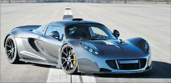  ?? — HENNESSEY ?? This 2014 Hennessey Venom GT set a new production car speed record last week in Florida.