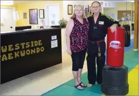  ?? BARB AGUIAR/Special to The Daily Courier ?? Michael Smith and his wife, Glenna, are saying goodbye to Westside Tae Kwon Do Thursday, a business they have built over the past 22 years, after suffering near-catastroph­ic financial losses due to the effects of the COVID-19 pandemic.