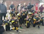  ?? COURTESY OF STEELE CITY YOUTH FOOTBALL MENTORSHIP PROGRAM ?? The 6U Lorain Steelemen celebrate after capturing the 2017 6U state championsh­ip at the state finals of the Ohio State Youth Football Conference on Nov. 4.