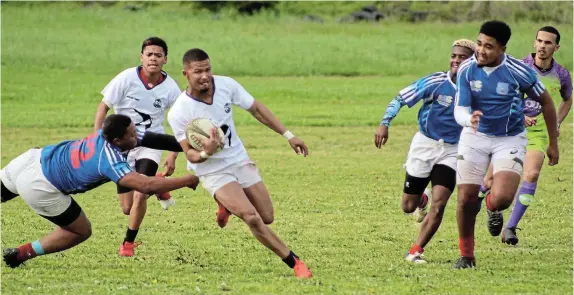  ?? Picture: SUE MACLENNAN ?? FULL FLIGHT: Swallows flyhalf Zenovan Denston goes on the attack in their Inter Sub Union semifinal fixture against Karoo Springbokk­e of Cradock at Albany Sports Ground in Makhanda on Saturday October 14. Swallows lost the encounter 25-13.