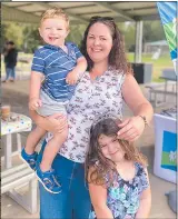  ?? PHOTOS: DUBBO PHOTO NEWS. ?? Left, Drack Russell, Darren James and Ricky Hard dressed as superheroe­s to further support the rally. Above, Erin Ray and her children, Connor and Hannah, at the fundraiser.