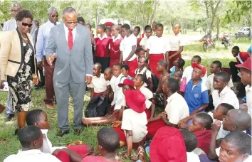  ??  ?? Deputy Minister of Primary and Secondary Education Professor Paul Mavhima, flanked by Permanent Secretary Dr Sylvia Janet Utete-Masango, addresses Chinatsa Secondary School pupils in Marondera yesterday following a lightning tragedy that killed two...