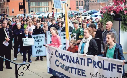  ??  ?? Hundreds of anti-abortion activists gather for a march and rally Jan. 21, 2017, at City Hall in downtown Cincinnati. MEG VOGEL/ THE CINCINNATI ENQUIRER VIA USA TODAY NETWORK