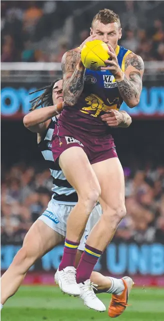  ??  ?? Brisbane’s Mitch Robinson marks in the preliminar­y final loss to Geelong at the Gabba. The result is motivating the Lions, says the veteran. Picture: GETTY