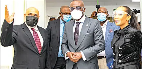  ??  ?? Chief Executive Officer, Evercare Hospital, Lekki, Rajeev Bhandari ( left); Lagos State Governor Babajide Sanwo- Olu and Evercare Executive Director ( Finance, Admin and Strategy), Temilade Awogboro at the official unveiling of the hospital in Lagos… yesterday.