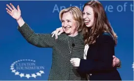  ?? Gerald Herbert / Associated Press ?? Hillary and Chelsea Clinton at the 2015 meeting of the Clinton Global Initiative, part of the Clinton Foundation. The foundation presents possible conflict of interest problems for the Democratic candidate.