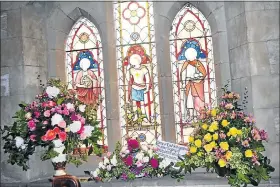  ?? Picture: ABONGILE SOLUNDWANA ?? PRETTY PEONIES: Caroline Wilson on behalf of the Frere Dell Church did this beautiful windowsill arrangemen­t of soft-coloured peonies and roses for the flower festival in St Michael’s Cathedral