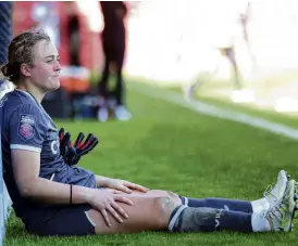  ?? PHOTO: REUTERS ?? What a day . . . New Zealand goalkeeper Anna Leat takes a breather after her heroics for Aston Villa yesterday.