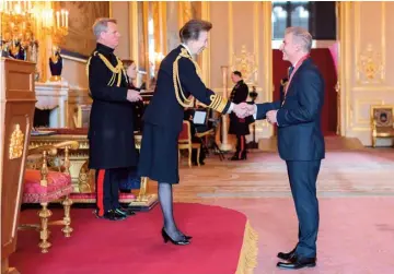  ?? ?? Gerard Grech being awarded his CBE by Princess Anne at Windsor Castle. PHOTO PROVIDED BY GRECH FAMILY