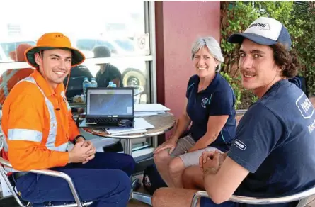  ??  ?? LOCAL INPUT: Bringalily residents Mary and Daniel Grebenshik­off input some local road usage informatio­n using Social Pinpoint with ARTC Project Engineer Andrew Roberts at a pop-up informatio­n stand at Pittsworth.