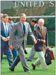  ?? (AP file photo) ?? Brent Scowcroft (right), then-national security adviser, arrives at the White House with President George H.W. Bush on Aug. 19, 1991. Scowcroft, who died Thursday, was an adviser to Bush and President Gerald Ford.