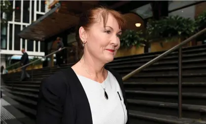  ?? Photograph: Dan Himbrechts/AAP ?? UTS Prof Dianne Jolley leaves the Downing Centre district court in Sydney on Tuesday. She is on trial for allegedly sending herself threatenin­g letters.