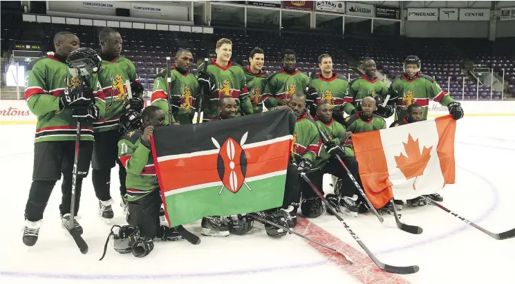  ?? — POSTMEDIA NEWS ?? NHL stars Sidney Crosby and Nathan MacKinnon played an exhibition game with a group of players from Kenya.