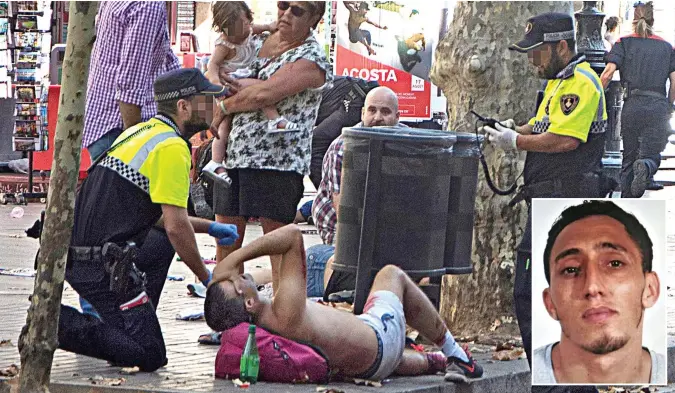  ?? Inset: Driss Oukabir, who is being quizzed by police ?? Terror in the street: An injured man is helped after a van was driven into tourists in Barcelona yesterday.